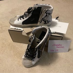 Like new Golden Goose Slides.  Includes the box, passport and shoes.  Worn once